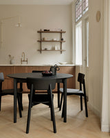 black oak bok round extendable dining table