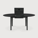 black oak bok round extendable dining table