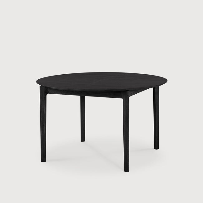 black oak bok round extendable dining table
