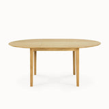 oak bok round extendable dining table