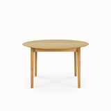 oak bok round extendable dining table